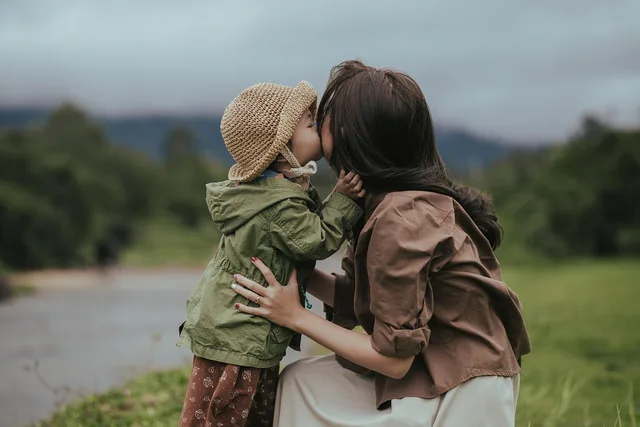 mother, daughter, kiss, parent, happy mothers day, child, people, family, love, closeup, mom, mum. Audience research for a parenting publication that studies the adult reader, not the child